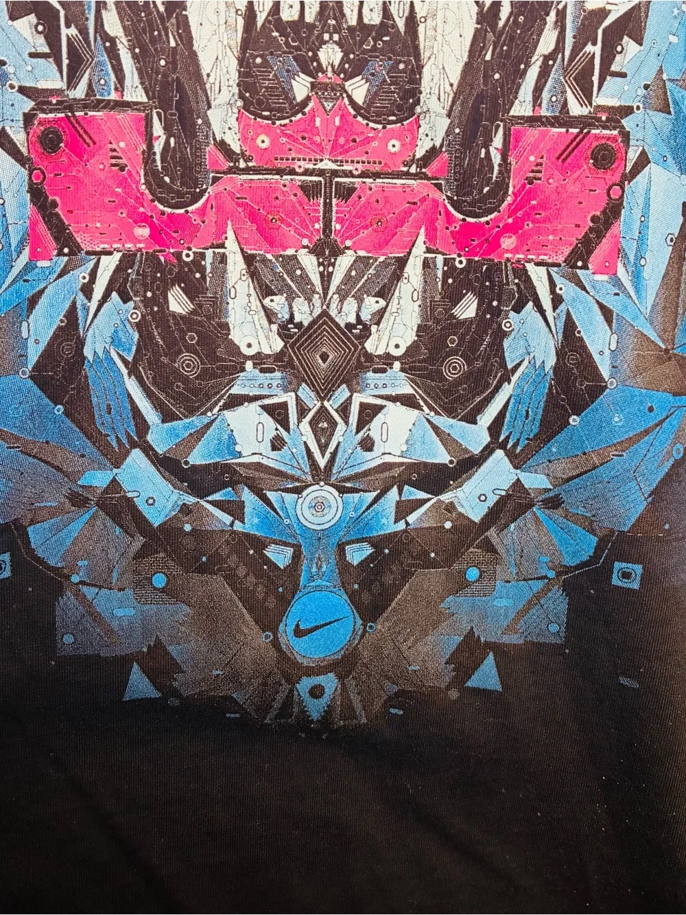 Nike Black Short Sleeve Tee with Blue Geometric Lion and Pink Accents